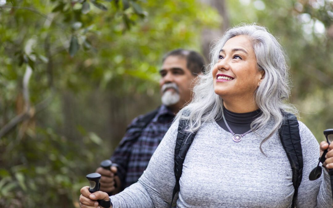 A senior mexican couple hiking